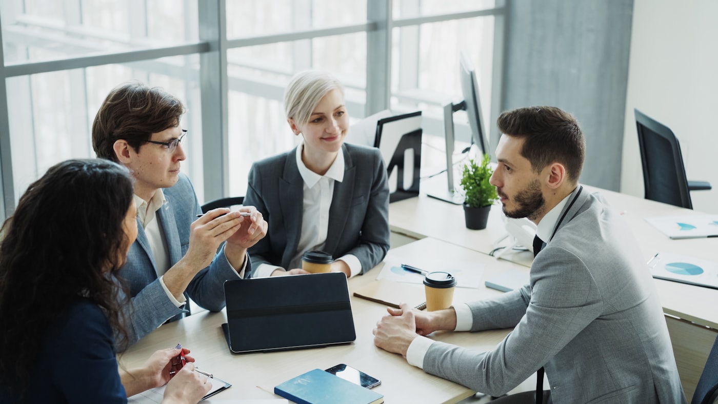 A diverse team collaborating together in a modern office